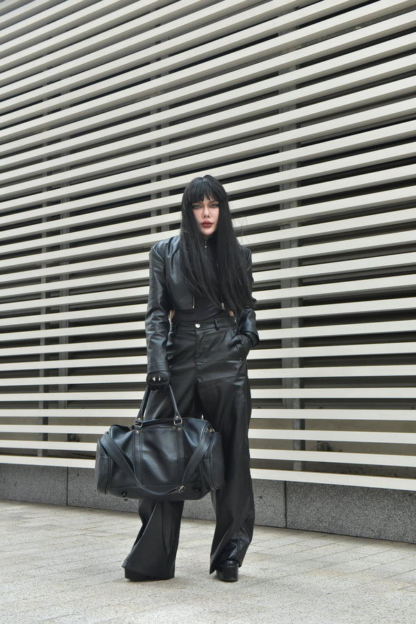 black leather duffel bag